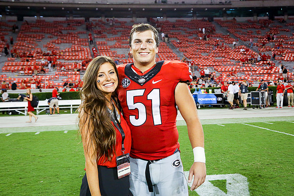 Jake's Proposal to Peyton After the Game by Blane Marable Photog