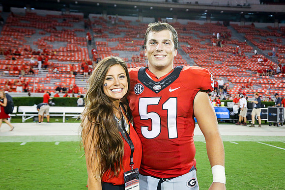Jake's Proposal to Peyton After the Game by Blane Marable Photog