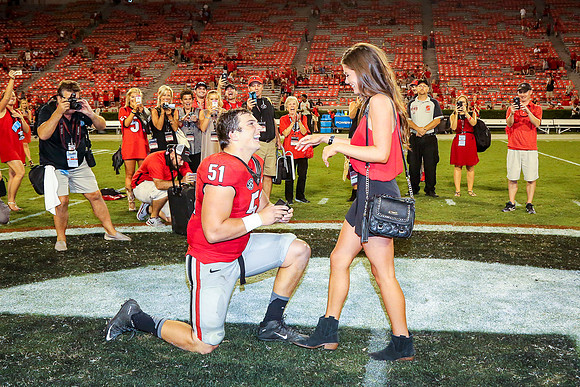 Jake's Proposal to Peyton After the Game by Blane Marable Photog