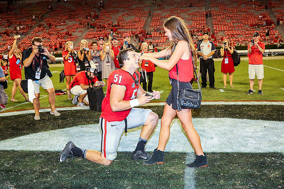 Jake's Proposal to Peyton After the Game by Blane Marable Photog