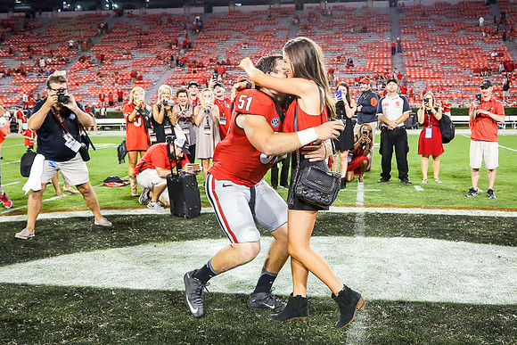 Jake's Proposal to Peyton After the Game by Blane Marable Photog