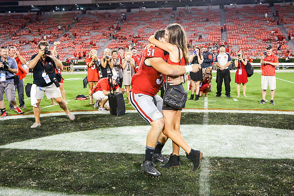 Jake's Proposal to Peyton After the Game by Blane Marable Photog