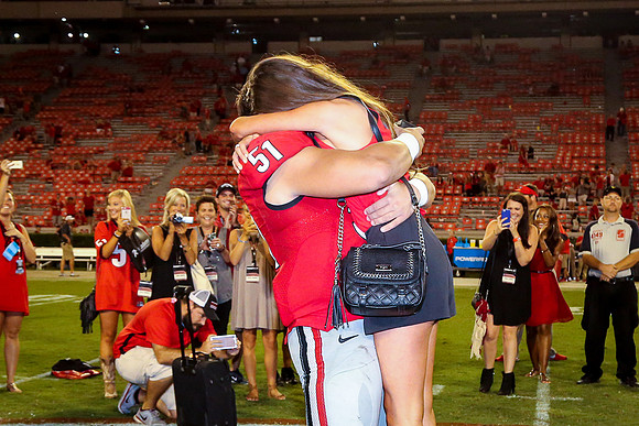 Jake's Proposal to Peyton After the Game by Blane Marable Photog