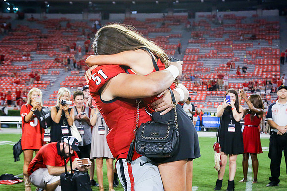 Jake's Proposal to Peyton After the Game by Blane Marable Photog