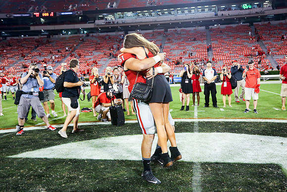 Jake's Proposal to Peyton After the Game by Blane Marable Photog