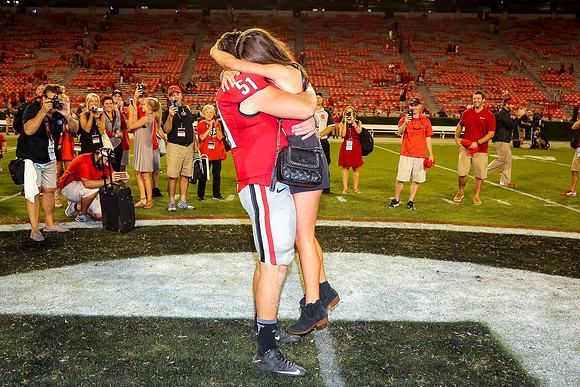 Jake's Proposal to Peyton After the Game by Blane Marable Photog