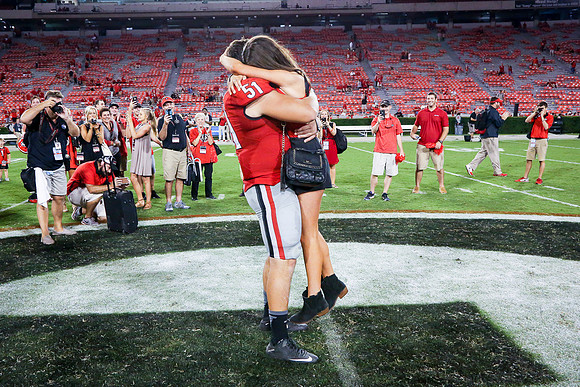 Jake's Proposal to Peyton After the Game by Blane Marable Photog