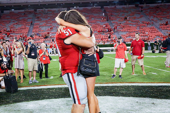 Jake's Proposal to Peyton After the Game by Blane Marable Photog