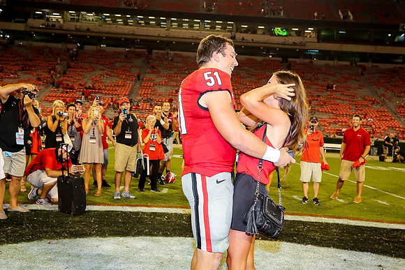Jake's Proposal to Peyton After the Game by Blane Marable Photog