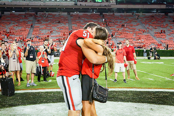 Jake's Proposal to Peyton After the Game by Blane Marable Photog