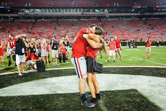 Jake's Proposal to Peyton After the Game by Blane Marable Photog