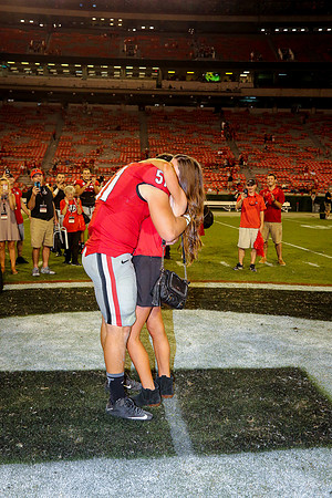 Jake's Proposal to Peyton After the Game by Blane Marable Photog