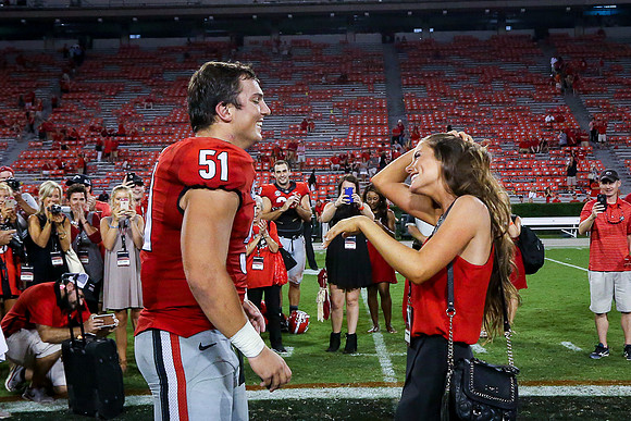 Jake's Proposal to Peyton After the Game by Blane Marable Photog