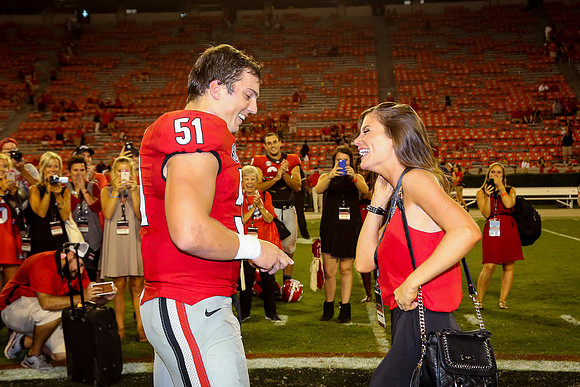Jake's Proposal to Peyton After the Game by Blane Marable Photog
