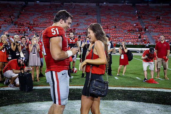 Jake's Proposal to Peyton After the Game by Blane Marable Photog