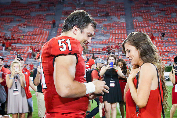 Jake's Proposal to Peyton After the Game by Blane Marable Photog