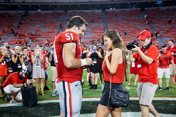 Jake's Proposal to Peyton After the Game by Blane Marable Photog