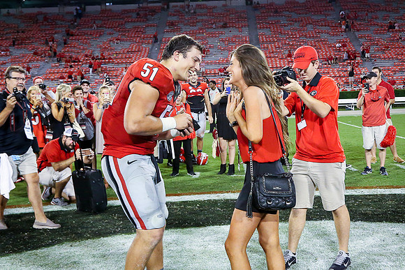 Jake's Proposal to Peyton After the Game by Blane Marable Photog