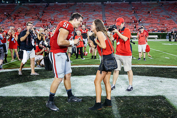 Jake's Proposal to Peyton After the Game by Blane Marable Photog