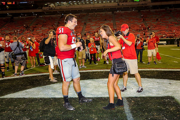 Jake's Proposal to Peyton After the Game by Blane Marable Photog