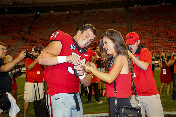 Jake's Proposal to Peyton After the Game by Blane Marable Photog