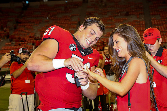 Jake's Proposal to Peyton After the Game by Blane Marable Photog