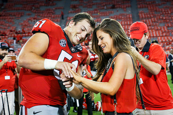 Jake's Proposal to Peyton After the Game by Blane Marable Photog