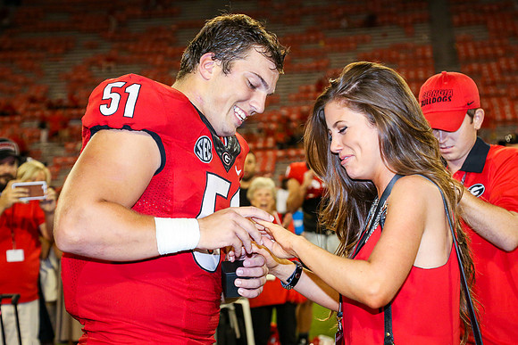 Jake's Proposal to Peyton After the Game by Blane Marable Photog