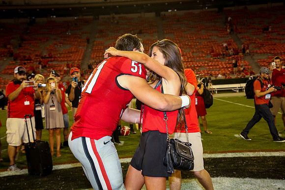 Jake's Proposal to Peyton After the Game by Blane Marable Photog
