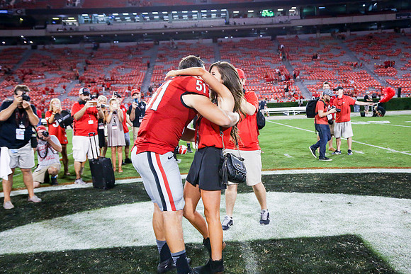 Jake's Proposal to Peyton After the Game by Blane Marable Photog