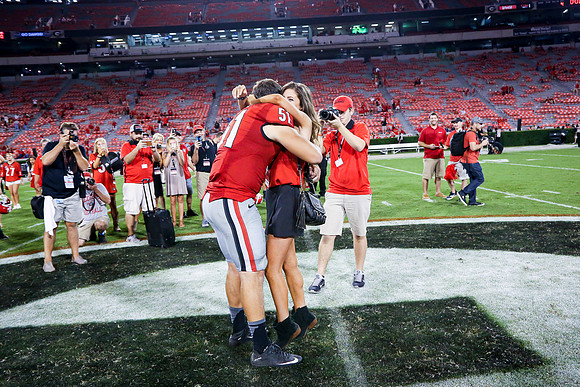 Jake's Proposal to Peyton After the Game by Blane Marable Photog