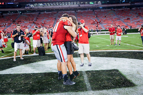 Jake's Proposal to Peyton After the Game by Blane Marable Photog