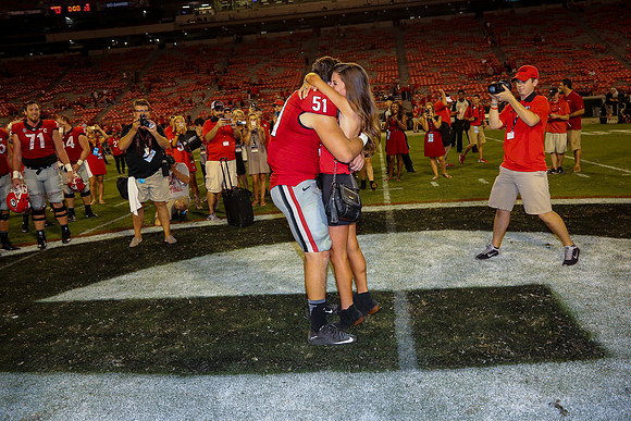 Jake's Proposal to Peyton After the Game by Blane Marable Photog