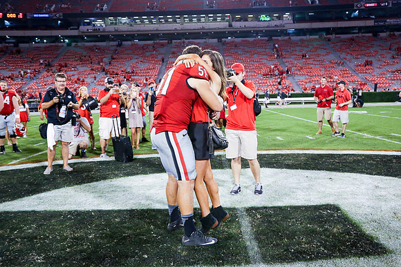 Jake's Proposal to Peyton After the Game by Blane Marable Photog