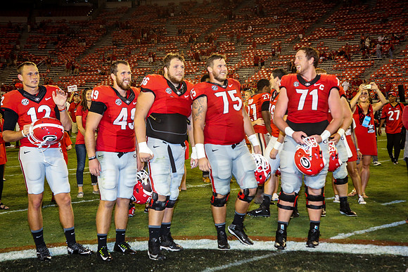 Jake's Proposal to Peyton After the Game by Blane Marable Photog