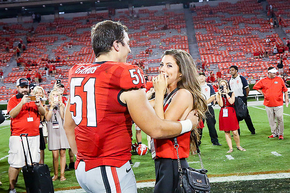 Jake's Proposal to Peyton After the Game by Blane Marable Photog