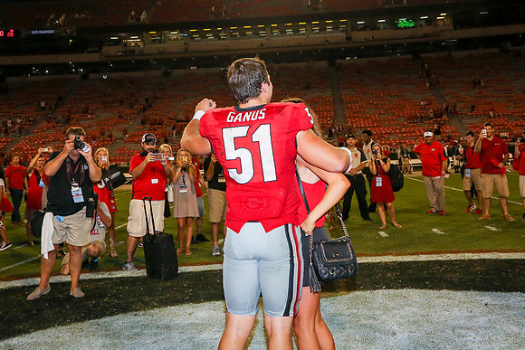Jake's Proposal to Peyton After the Game by Blane Marable Photog