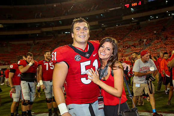 Jake's Proposal to Peyton After the Game by Blane Marable Photog
