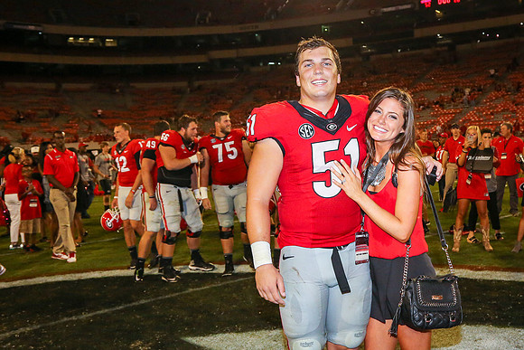 Jake's Proposal to Peyton After the Game by Blane Marable Photog