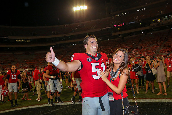 Jake's Proposal to Peyton After the Game by Blane Marable Photog