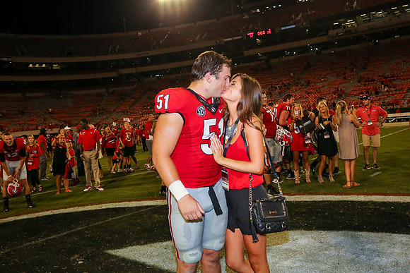 Jake's Proposal to Peyton After the Game by Blane Marable Photog