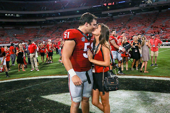 Jake's Proposal to Peyton After the Game by Blane Marable Photog