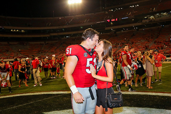Jake's Proposal to Peyton After the Game by Blane Marable Photog
