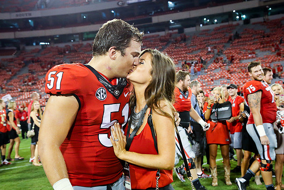Jake's Proposal to Peyton After the Game by Blane Marable Photog