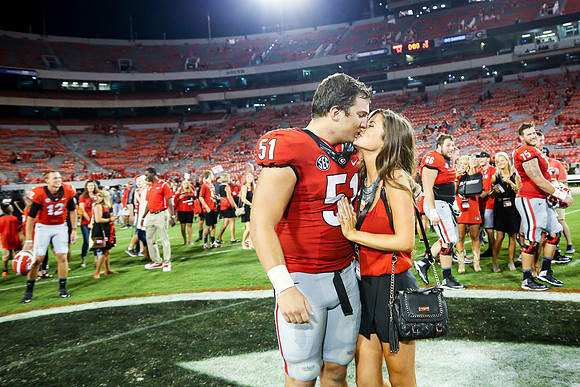 Jake's Proposal to Peyton After the Game by Blane Marable Photog