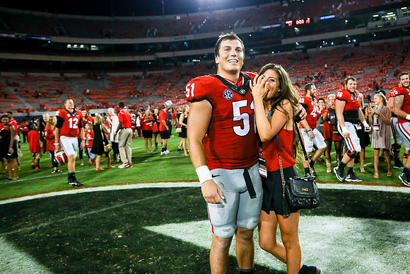 Jake's Proposal to Peyton After the Game by Blane Marable Photog