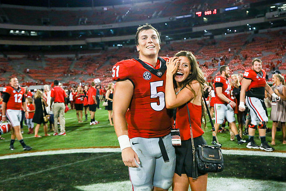 Jake's Proposal to Peyton After the Game by Blane Marable Photog