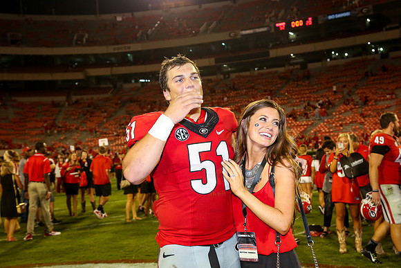 Jake's Proposal to Peyton After the Game by Blane Marable Photog