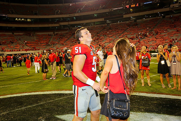 Jake's Proposal to Peyton After the Game by Blane Marable Photog