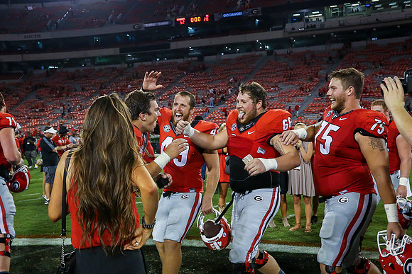 Jake's Proposal to Peyton After the Game by Blane Marable Photog